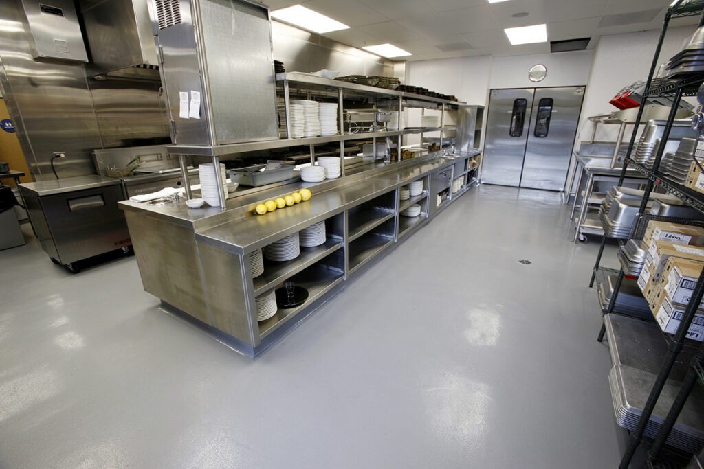 Modern commercial kitchen with high-performance flooring systems