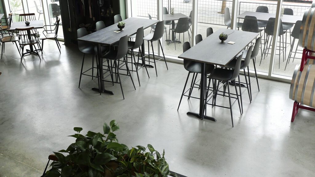 Finalized installation of commercial kitchen flooring in a restaurant setting